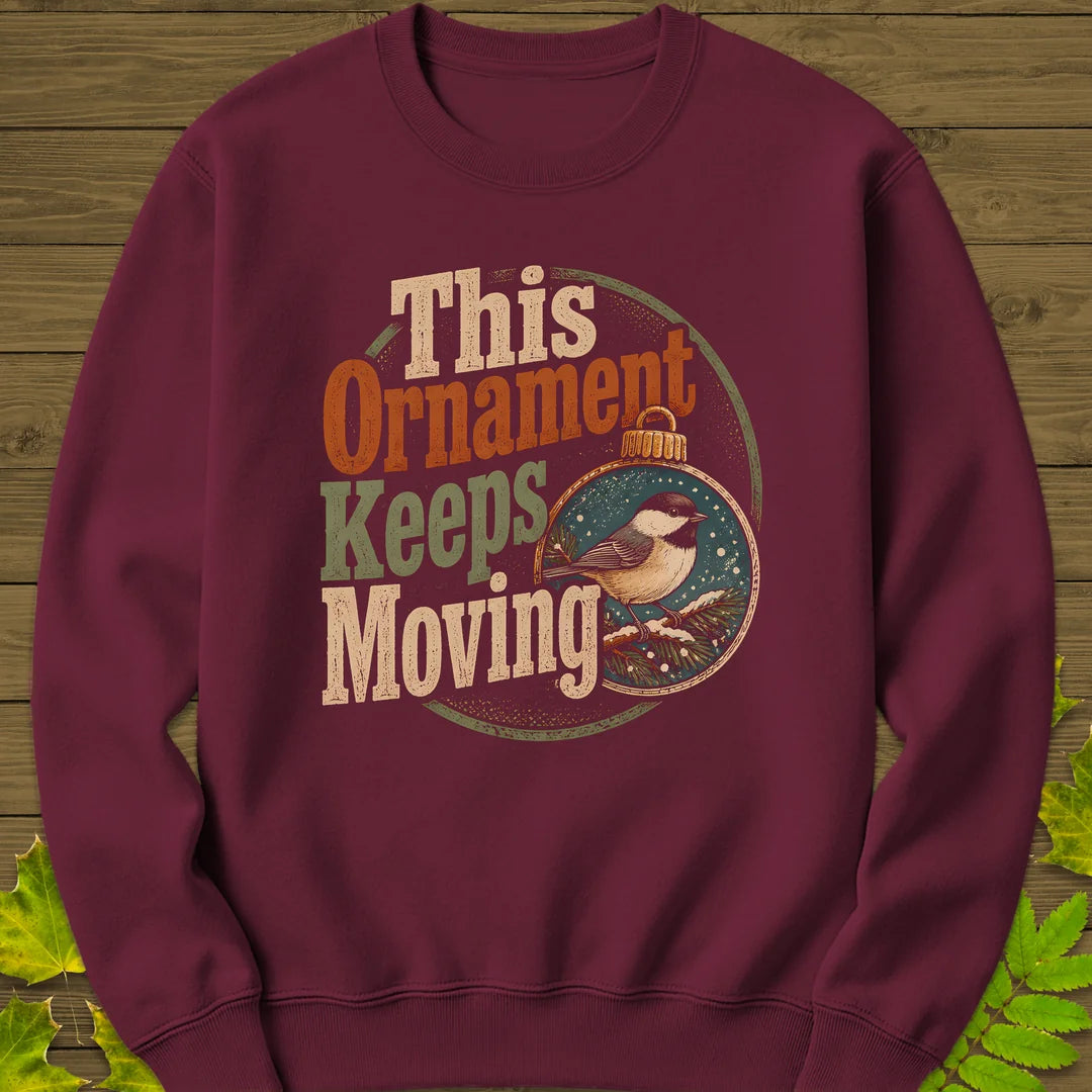 Ornament Keeps Moving Sweatshirt in Maroon